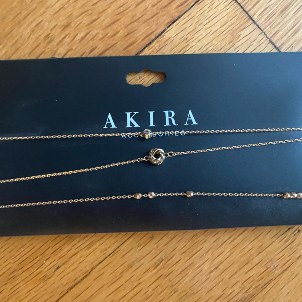 NWT 3 separate gold chokers with lobster claw closure.
